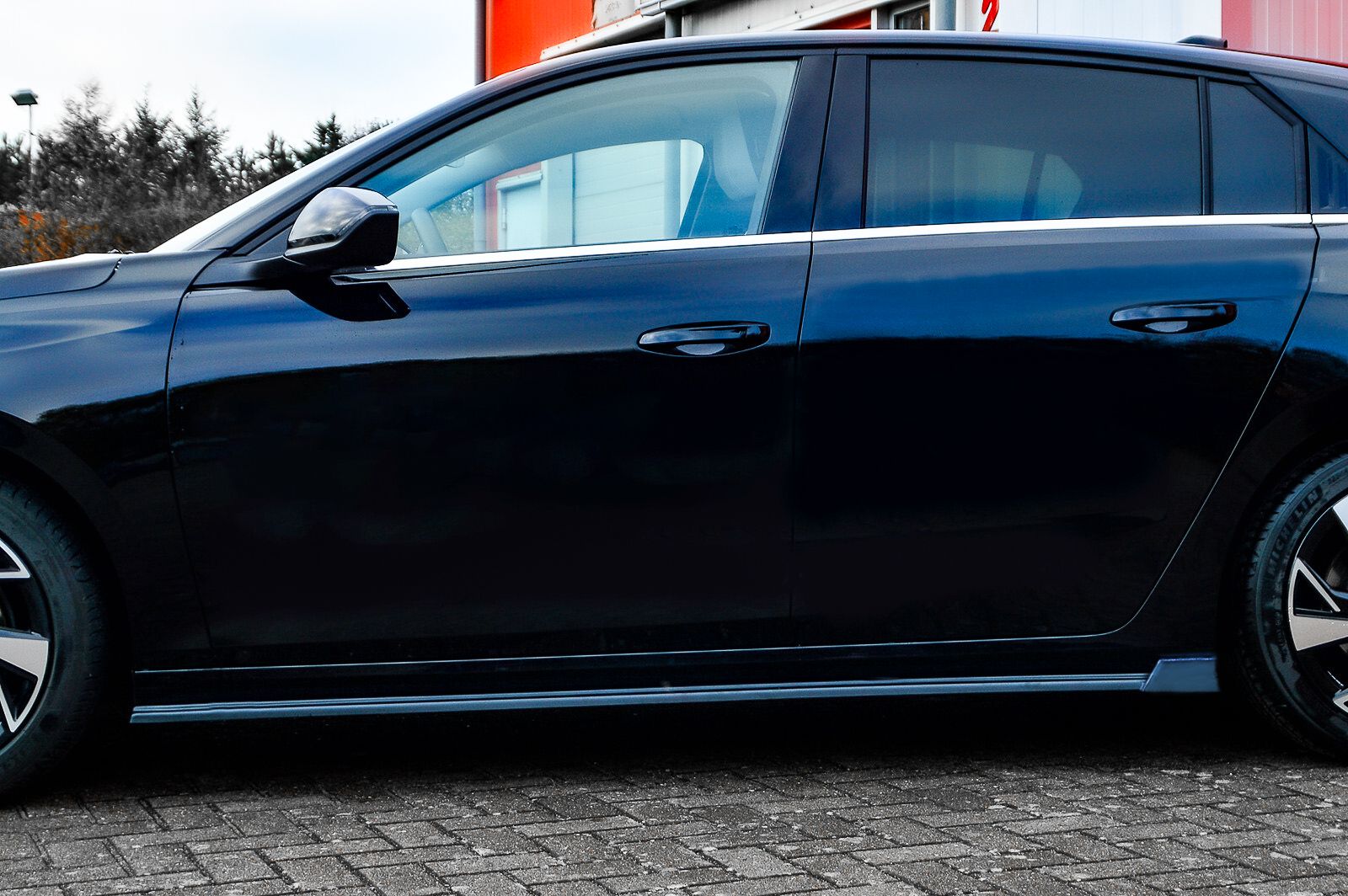 Cup Seitenschweller aus ABS mit Wing hinten passend für Opel Astra L